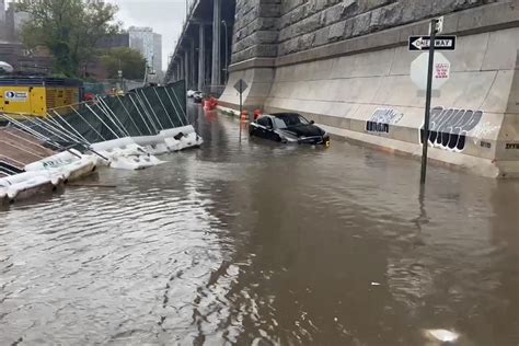 Rush-hour storm floods New York City area, swamping streets and stranding people in traffic